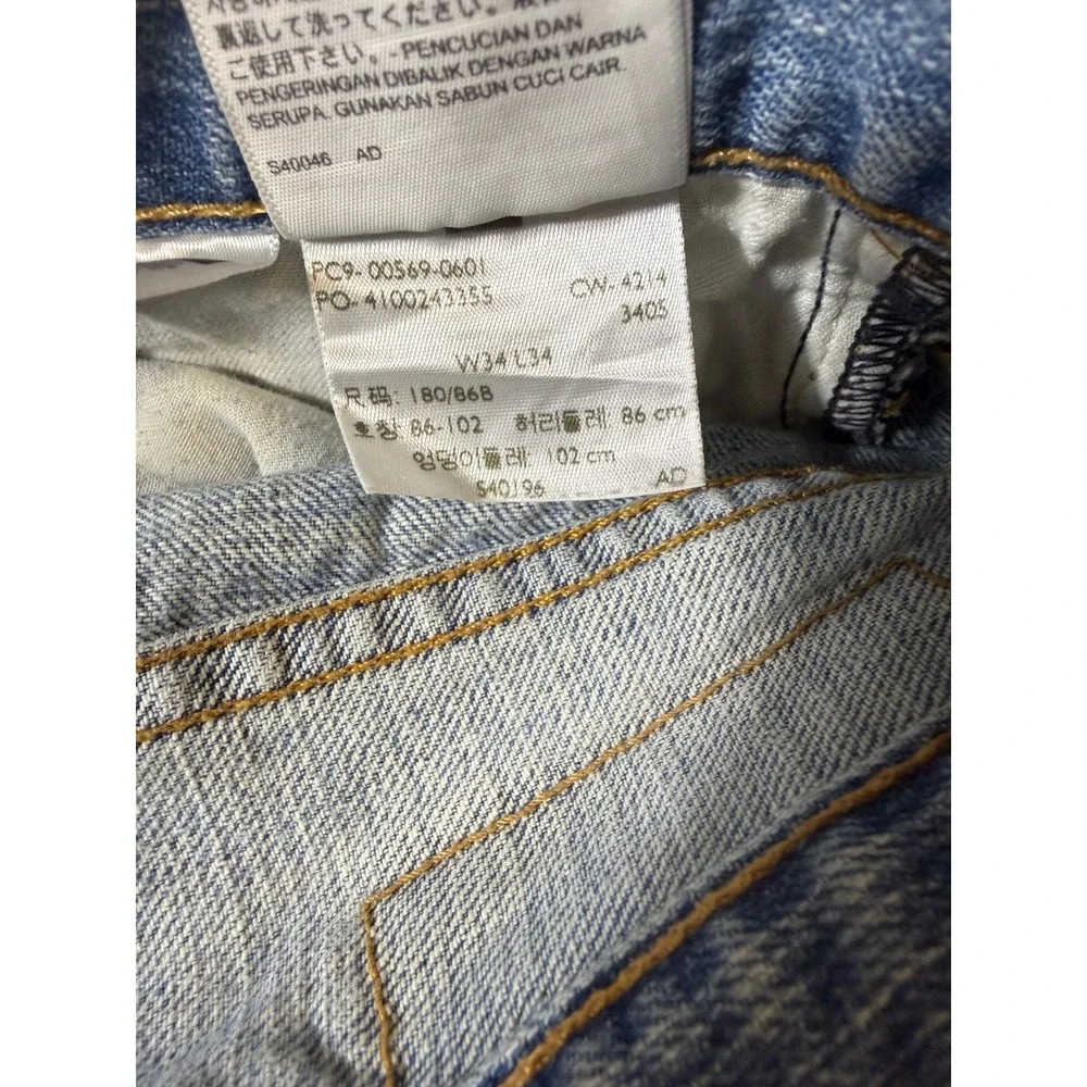 Levi's 569 Loose Straight Mens Jeans 34x34 Light Wash Blue Distressed Good